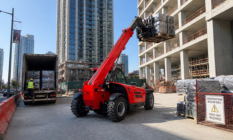 HT2506 Telehandler Working in a Tight Urban Staging Area for High-Rise Construction