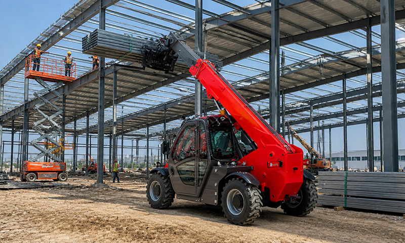 HT2506 Telehandler Raising Roof Trusses for a Steel Structure Workshop