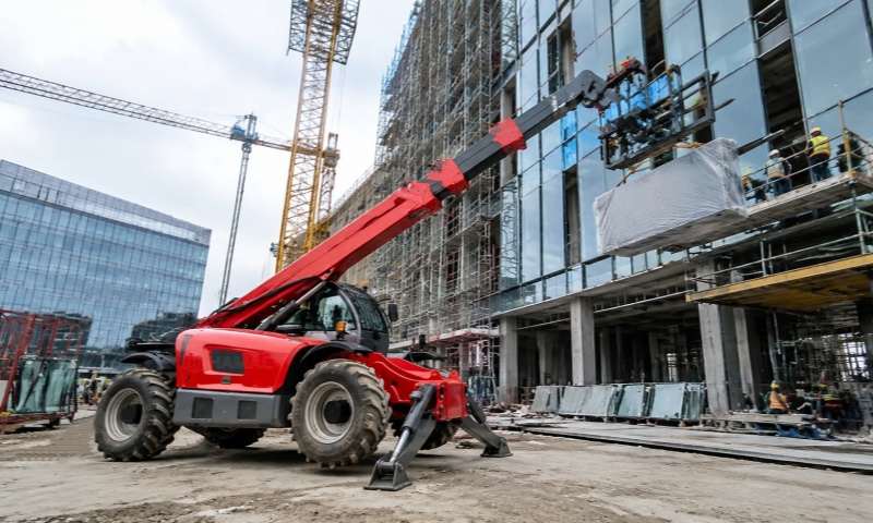 Telehandler Assisting Facade and Curtain Wall Installation